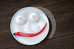 Smiley face made from pepper and garlic