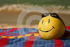 Smiley Faced Volleyball With Swim Goggles