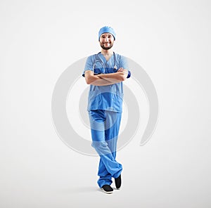 Smiley man in blue scrubs