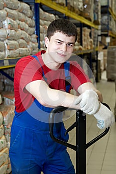 Smiley worker at warehouse