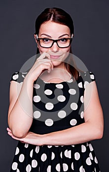 Smiley young woman in glasses