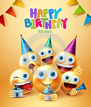 Smileys birthday greeting vector design. Happy birthday text with smiley emojis in party celebration with hats, cup cake and gift.