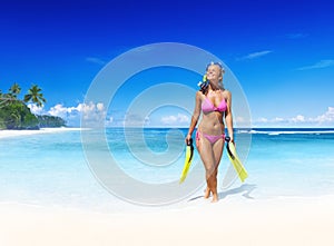 Smilig Woman with Scuba Gear on a Tropical Beach