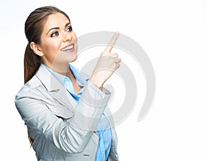 Smilinf business woman pointing on space. Isolated white