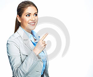 Smilinf business woman pointing on space. white