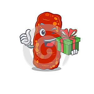 Smiling acinetobacter bacteria cartoon character having a green gift box