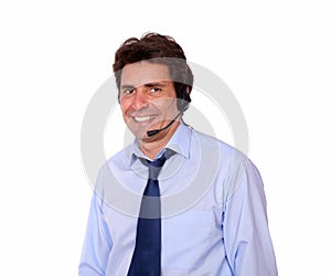 Smiling adult man using headphones and microphone