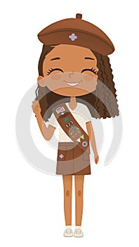 Smiling African American girl scout wearing sash