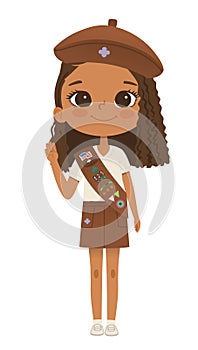 Smiling African American girl scout wearing sash