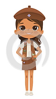 Smiling African American girl scout wearing sash