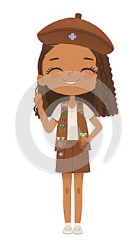 Smiling African American girl scout wearing vest