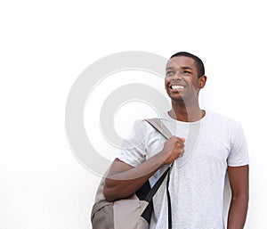 Smiling african american male student thinking