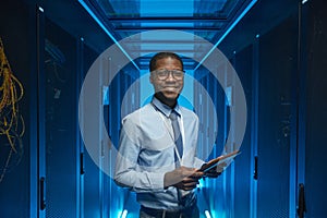 Smiling African American Man in Data Center