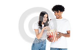 smiling african american man holding popcorn