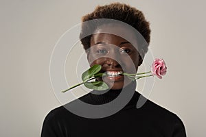 Smiling african american woman in black