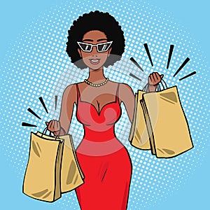 Smiling african american woman with shopping bags vector illustration in pop art retro comic style eps10