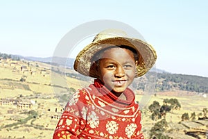 Smiling african boy with hat on head