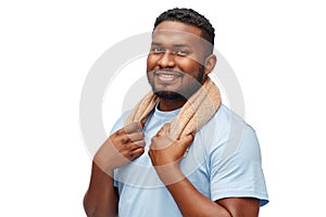 Smiling african man with bath towel