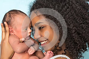 Smiling african mother and baby