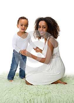 Smiling African mother and toddler