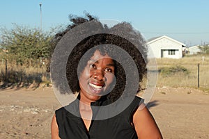 SMILING AFRICAN WOMAN