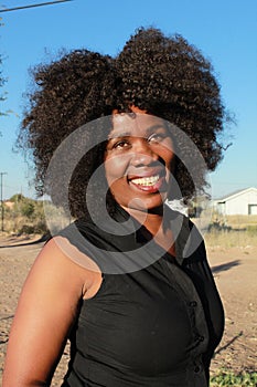 SMILING AFRICAN WOMAN