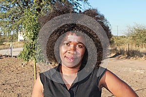 SMILING AFRICAN WOMAN