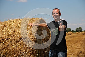 Smiling Agriculturist Showing Thumbs Up