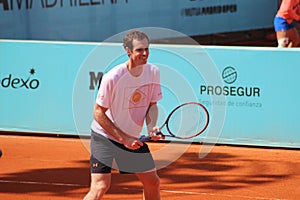 Smiling Andy Murray at the practice.