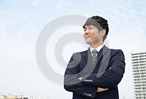 Smiling Asian businessman