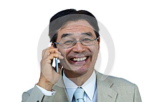 Smiling asian businessman phone calling