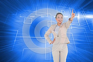 Smiling asian businesswoman pointing