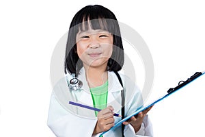 Smiling Asian Chinese Little Doctor Writting On Clip Board