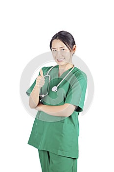 Smiling asian female doctor with stethoscope gesturing thumbs up