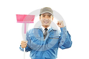 Smiling Asian janitor
