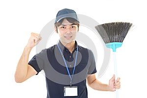 Smiling Asian janitor