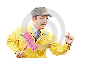 Smiling Asian janitor