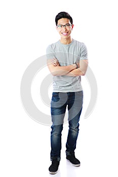 Smiling asian man with arms folded