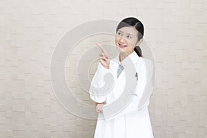 Smiling Asian pharmacist