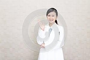 Smiling Asian pharmacist