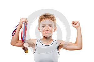 Smiling athlete champion boy gesturing for victory triumph