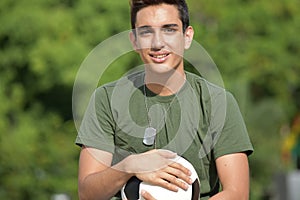 Smiling Athletic Hispanic Male Teen Soldier