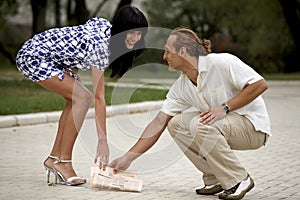 Smiling attractive couple meeting in summer park