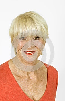 Smiling attractive senior woman in studio