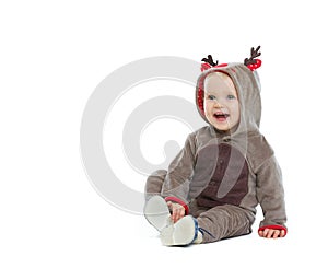 Smiling baby in Christmas costume