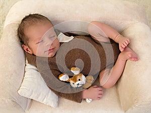 Smiling baby on couch