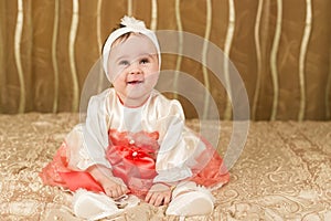 Smiling baby girl dressed formal