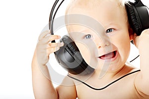 Smiling baby with headphone