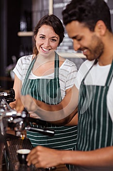 Smiling baristas working