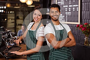 Smiling baristas working